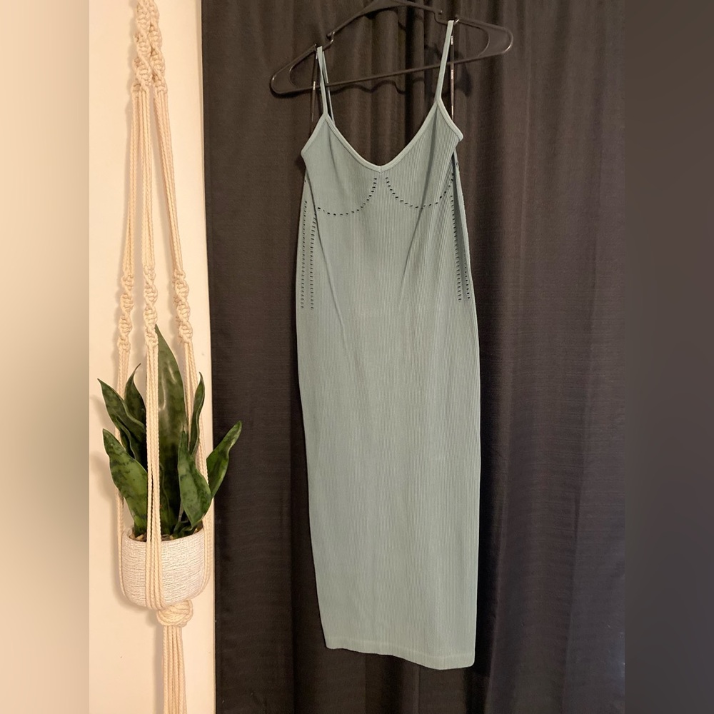 Forever 21 midi dress. Size S/M. Soft, teal color. Cut out details on boob area.